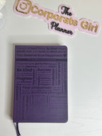 Purple A5 notebook with holographic edges and embossed cover with positive affirmations. Bulleted paper with pocket on the back.