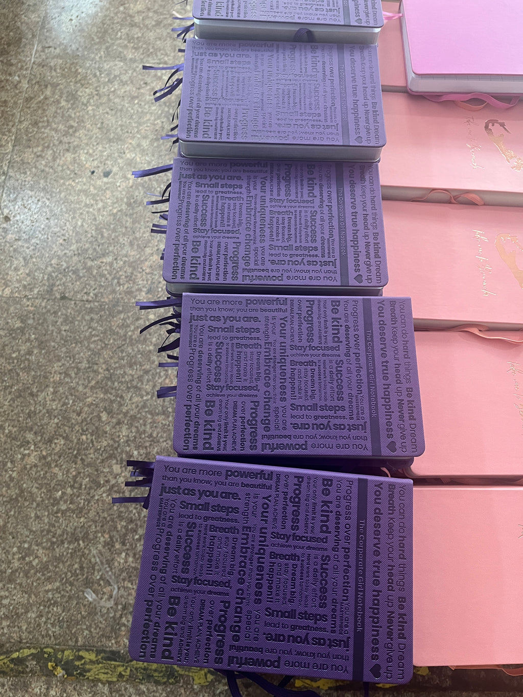 Purple A5 notebook with holographic edges. 