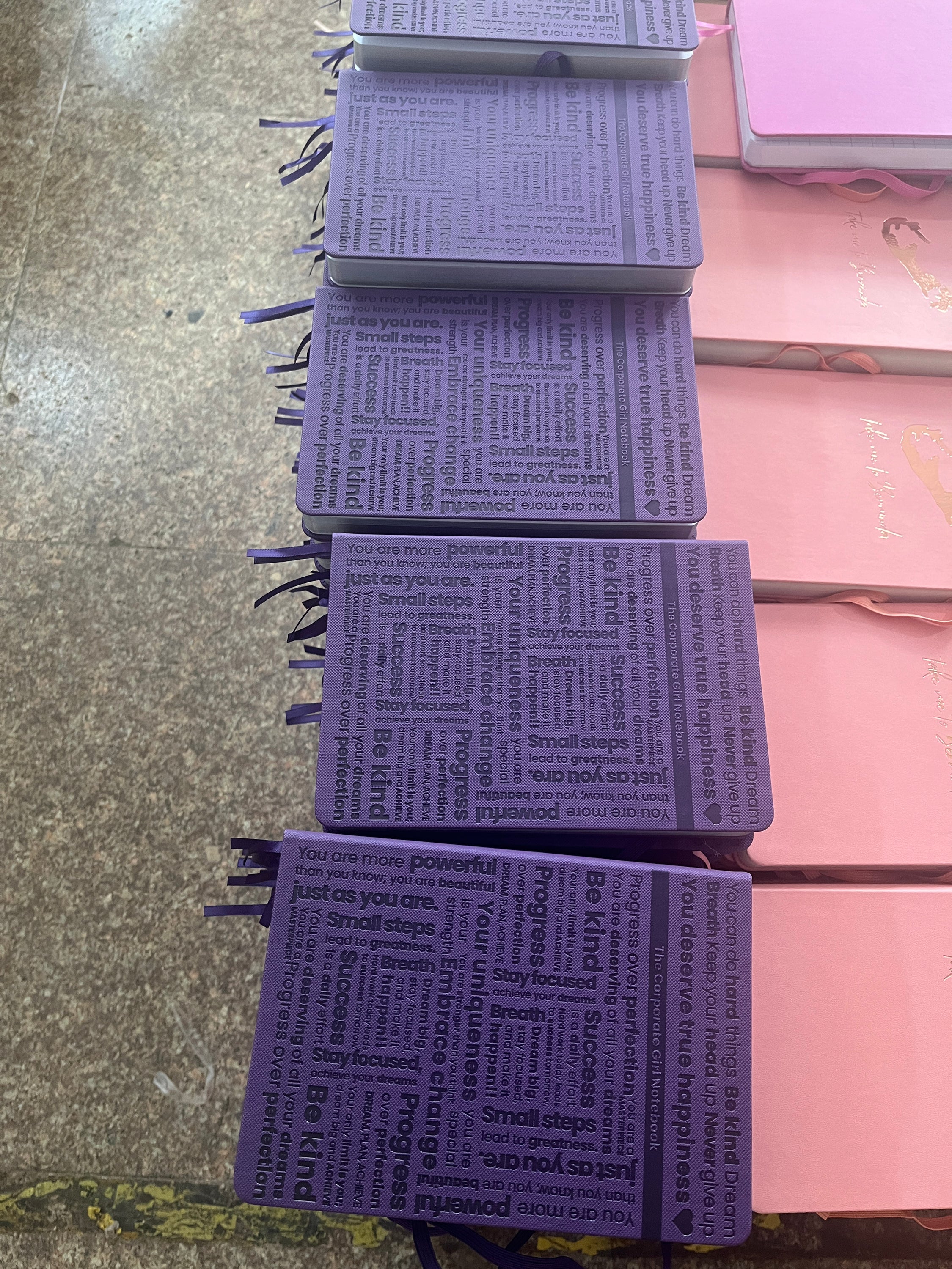 Purple A5 notebook with holographic edges. 