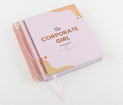 The Corporate Girl Daily Planner Undated, with stickers, meeting notes, daily dockets, birthdays to remember, notes section and a budget section. 