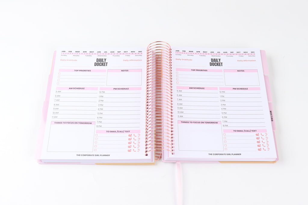 The Corporate Girl Daily Planner Undated, with stickers, meeting notes, daily dockets, birthdays to remember, notes section and a budget section. 