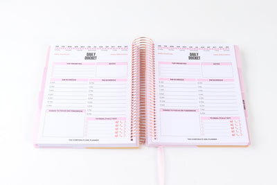 The Corporate Girl Daily Planner Undated, with stickers, meeting notes, daily dockets, birthdays to remember, notes section and a budget section. 