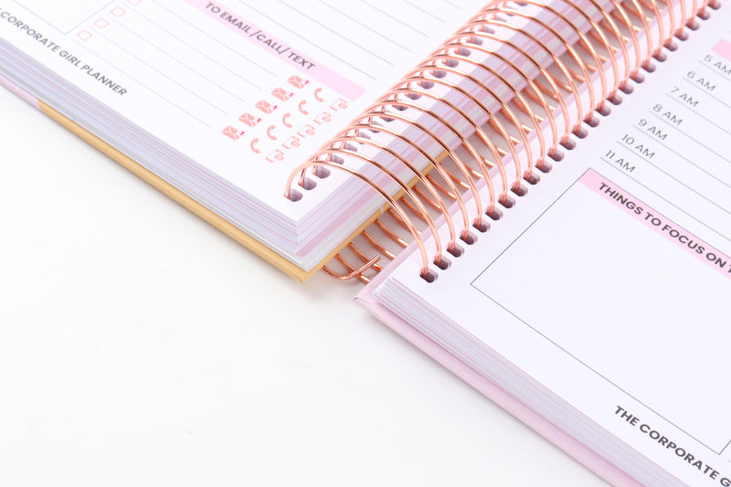 The Corporate Girl Daily Planner Undated, with stickers, meeting notes, daily dockets, birthdays to remember, notes section and a budget section. 